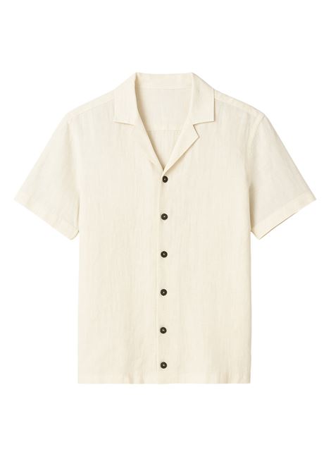 The white linen men's shirt model AU-1470L 1003 by Alpha Studio is a relaxed-cut essential with a mandarin collar and dark gray buttons, perfect for summer days and a smart but casual look. ALPHA STUDIO |  | AU-1470L1003